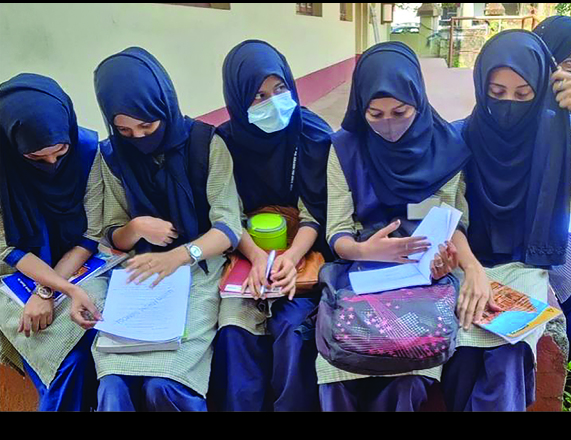 In India, wearing hijab bars some Muslim students from class