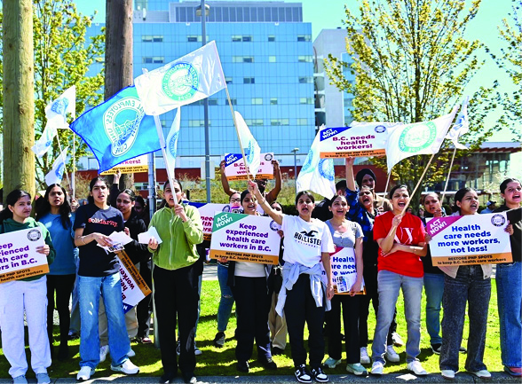 Health care workers rally to demand restoration of immigration pathways